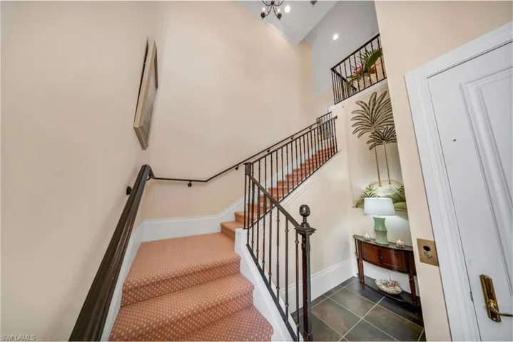 Foyer from front door and garage, with the elevator door.