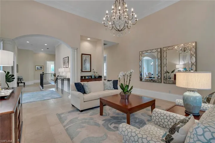 This two-story condo boasts of high ceilings, generous moldings, and neutral tile flooring in the main living areas.
