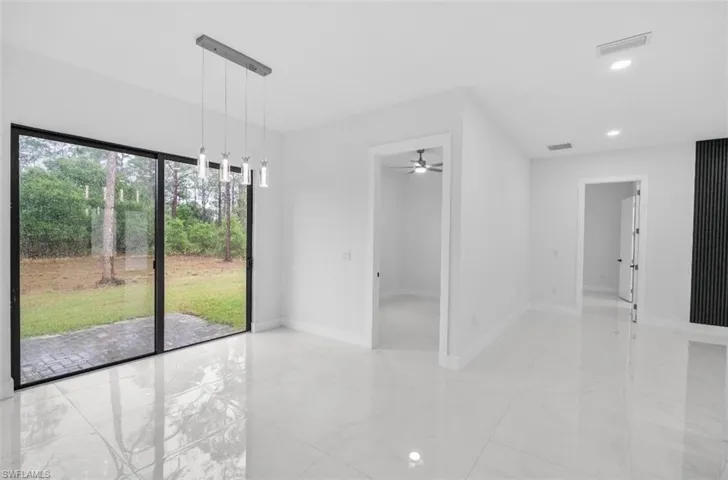 Unfurnished room featuring recessed lighting and a ceiling fan
