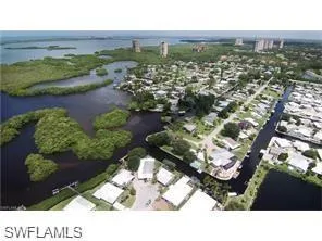 Bird's eye view as a boater leaving the canal system of Spring Creek Village and heading toward Estero Bay and Gulf of Mexico.