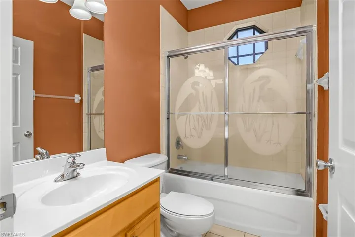 Versatile flex room features french doors and can be utilized as a den, office or third bedroom. *furnishings are digitally staged.