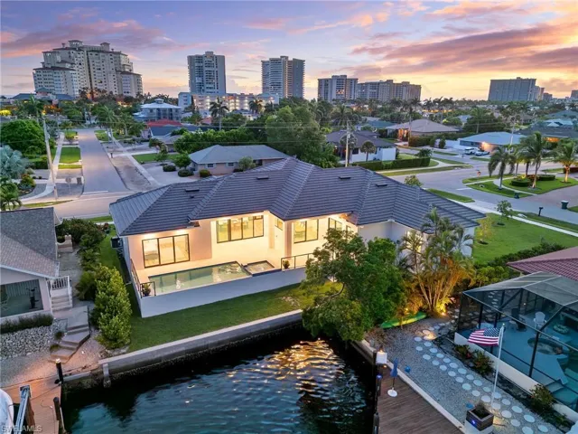 Aerial view at dusk with a water view