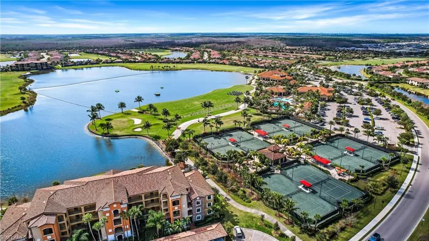 Bird's eye view of a local golf course and a large body of water