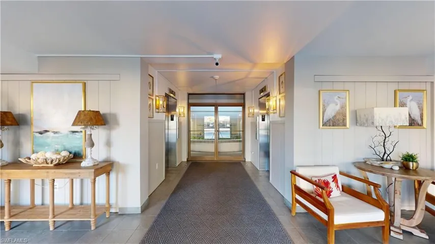 Corridor with wooden walls and elevator