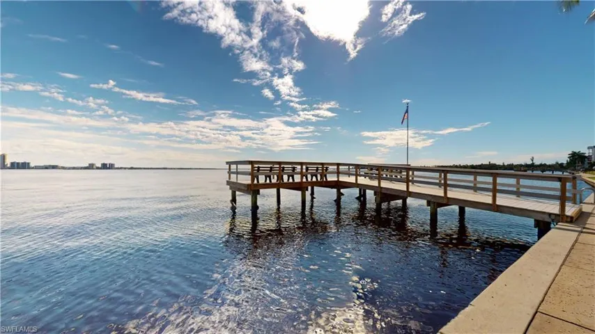 Dock featuring a water view