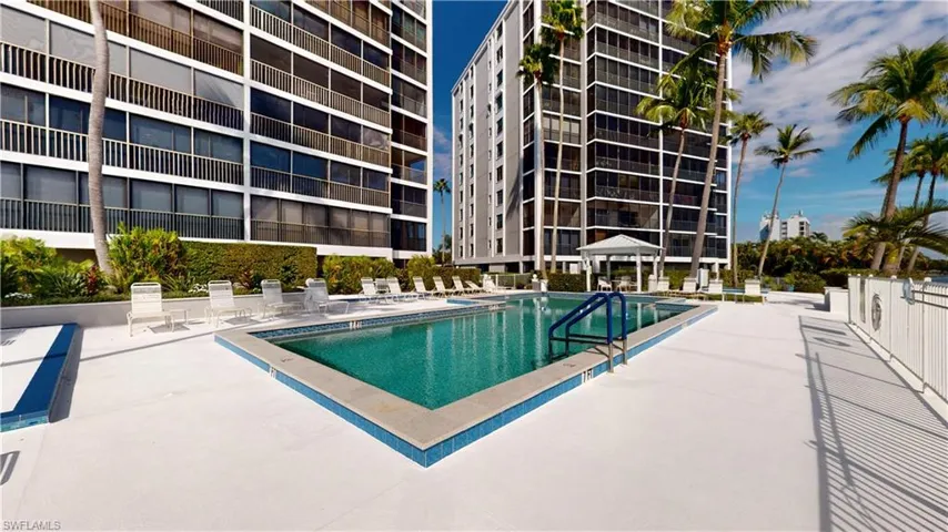 Community pool featuring a patio area