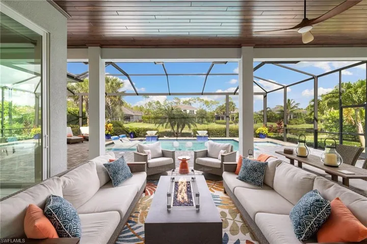 Sunroom / solarium featuring wooden ceiling