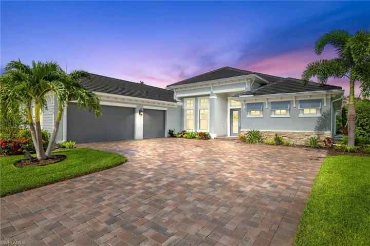 View of front of house with a garage