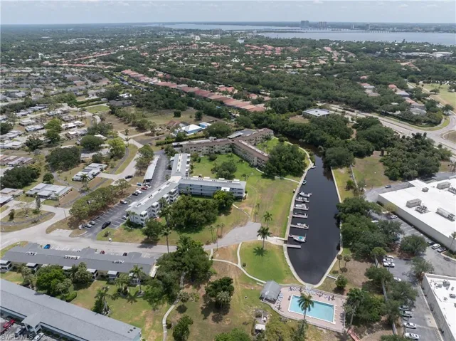 Aerial overview of property's location featuring a nearby body of water