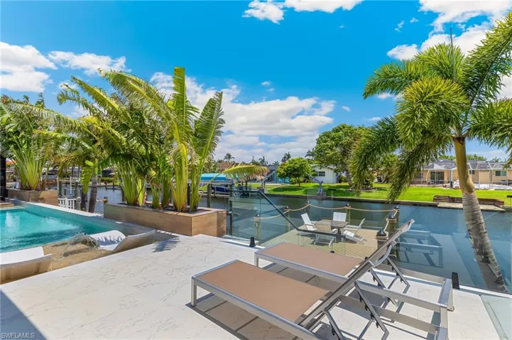 Outdoor pool with a water view