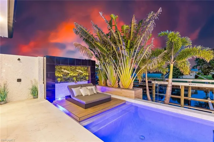 View of pool featuring a water view
