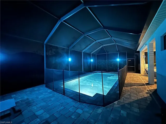 View of pool featuring a lanai and a patio