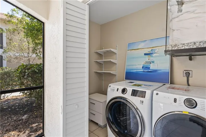 Storage area with brand new washer and dryer.