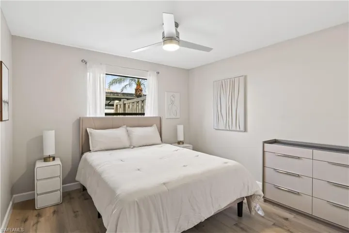This inviting guest bedroom is a cozy and comfortable space.