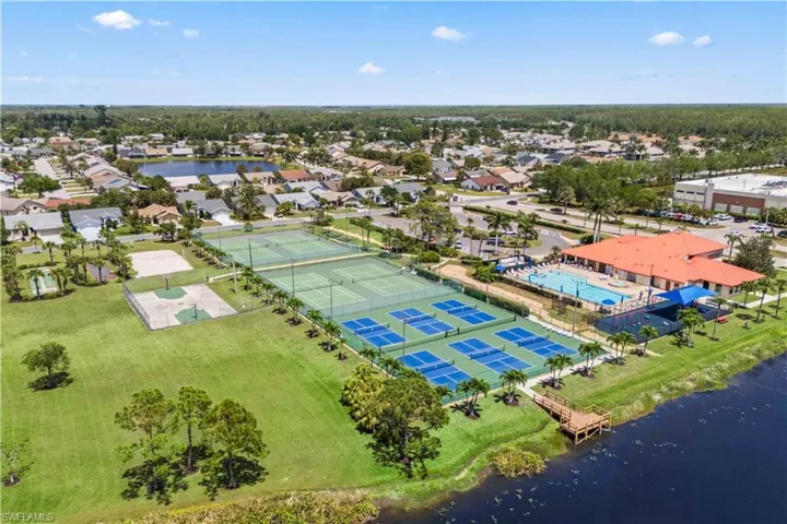 Enjoy the array of amenities within the community, including two pools, tennis courts, and a fitness center.