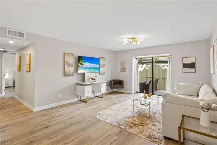 A bright and inviting living room with an open-concept design.