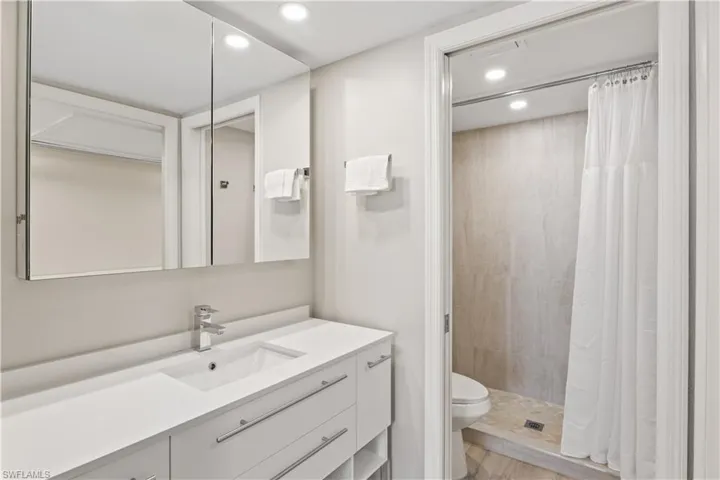 En-suite bathroom with a new vanity and a walk-in shower.