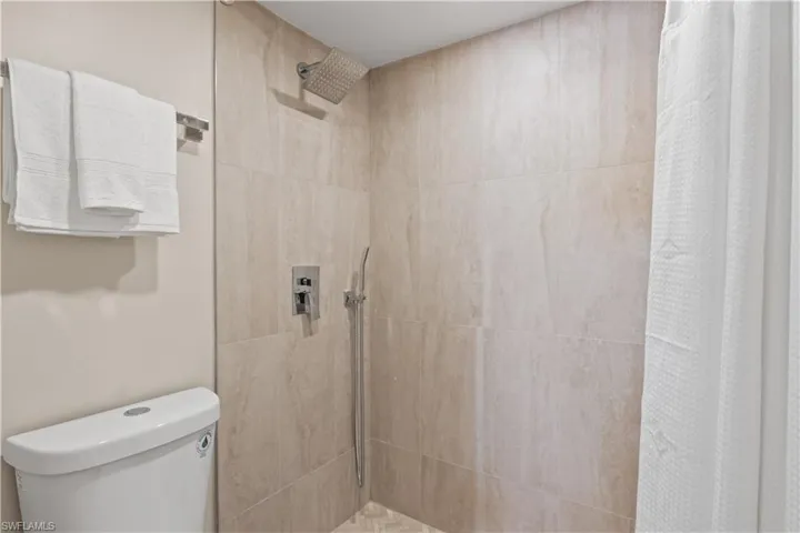 The stylish finishes complement the overall renovation, providing a spa-like experience.