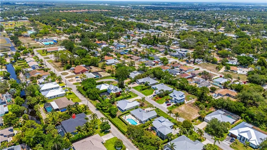 Aerial overview of property's location with nearby suburban area