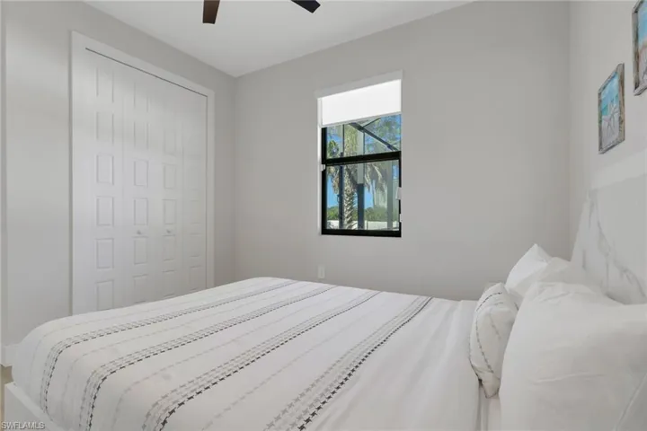 Bedroom featuring a ceiling fan