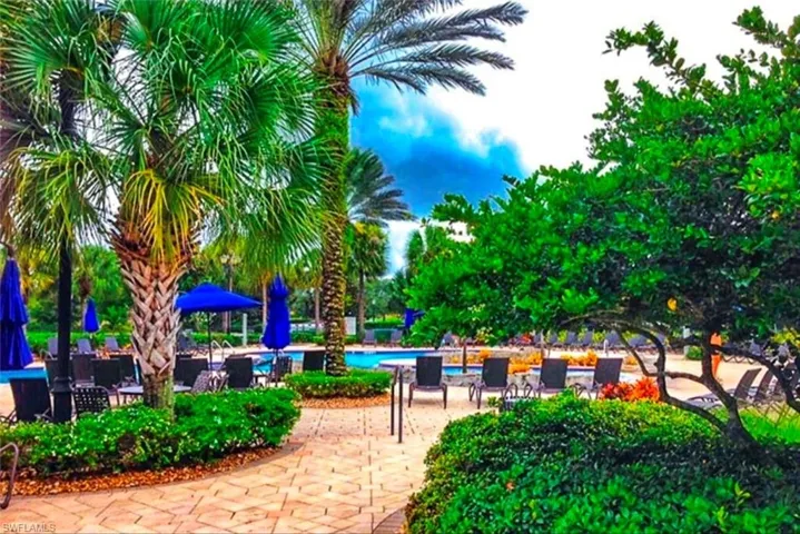View of community with a patio and a pool