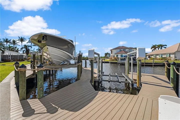 New 40,000 lb boat lift and composite walk around dock.