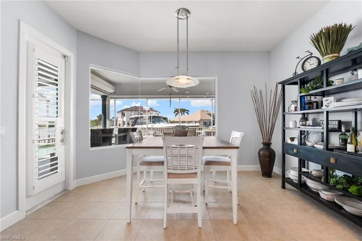 Dining room featuring light tile patterned floors