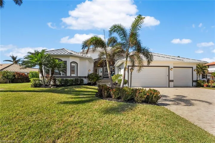 New metal roof, New exterior paint, new garage doors, new landscaping.