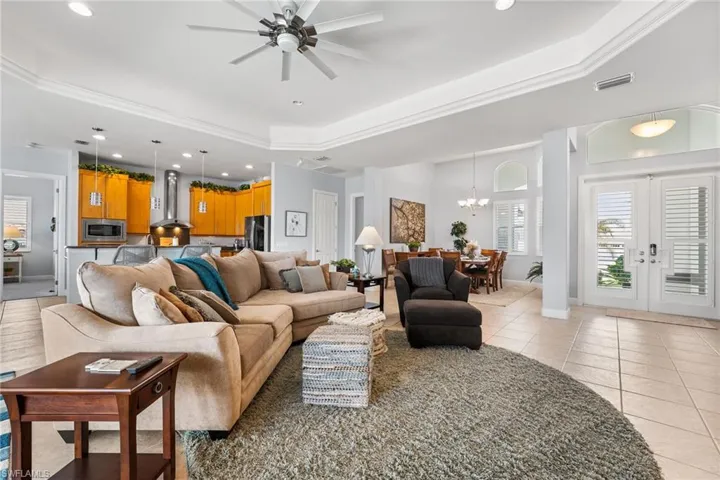 42" wood kitchen cabinets,stainless steel appliances, new ceiling fan. There is a formal dining area.