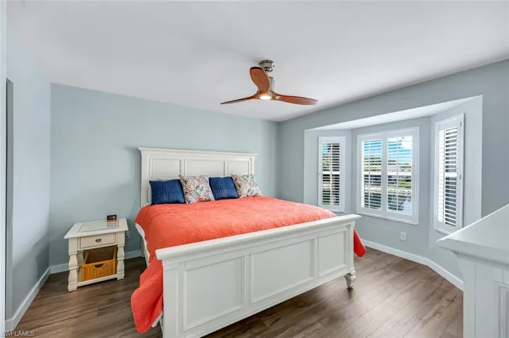 Spacious Primary Bedroom with big lake views from the bay window.  Plantation Shutters throughout...