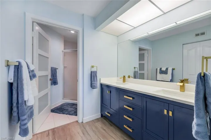 Please note the walk-in closet features closet shelving.