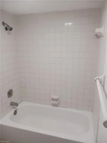 Full bathroom with  shower combination