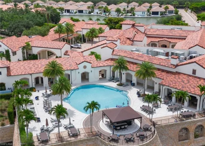 Community pool with a patio area