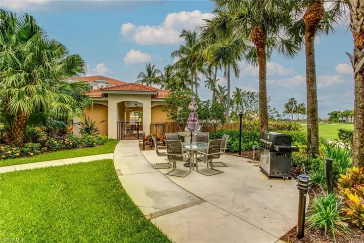 View of patio featuring area for grilling near the pool at Bellavista