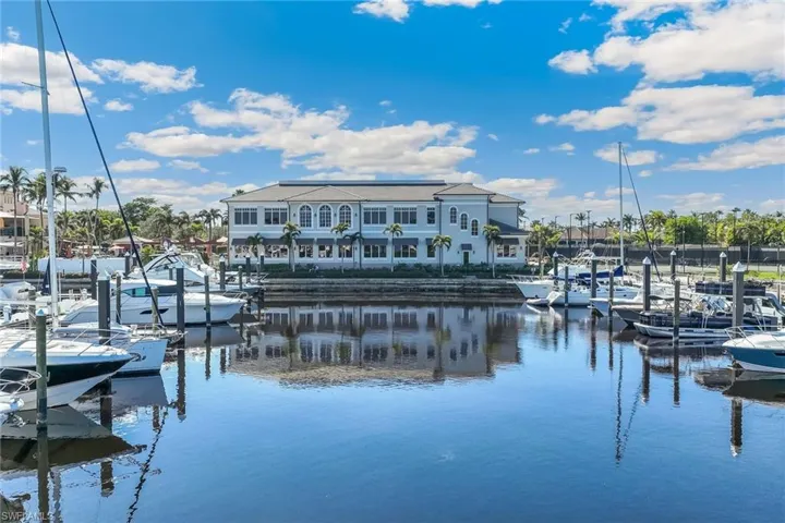 View of dock featuring a water view in the Gulf Harbour marina area