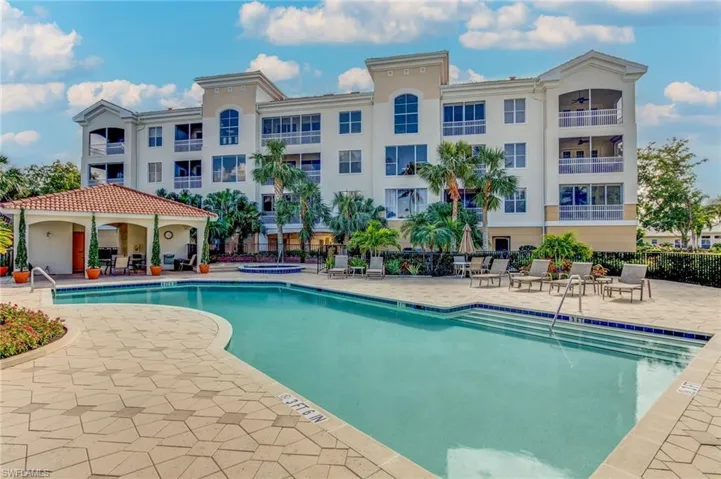 View of community swimming pool with a patio at Bellavista
