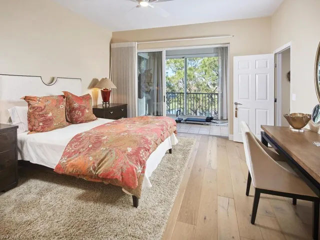 Luxurious bedroom featuring direct access to the lanai.