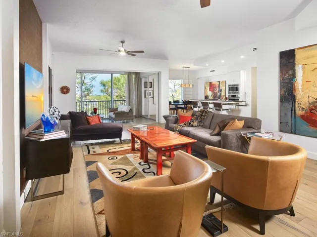 Beautifully designed living room with a seamless flow to the kitchen and dining areas.