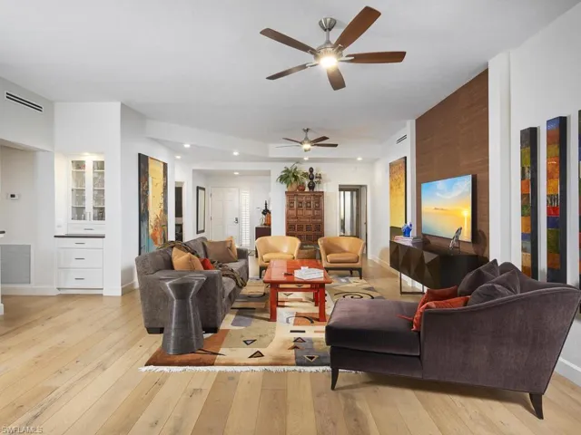 Cozy yet sophisticated space with high ceilings and ample seating.