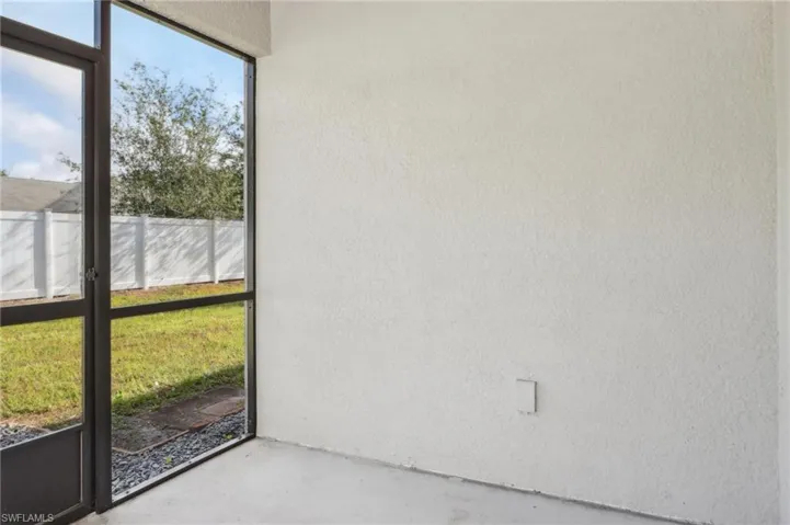 Unfurnished sunroom with plenty of natural light