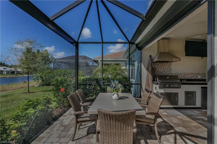 screen patio with outdoor kitchen