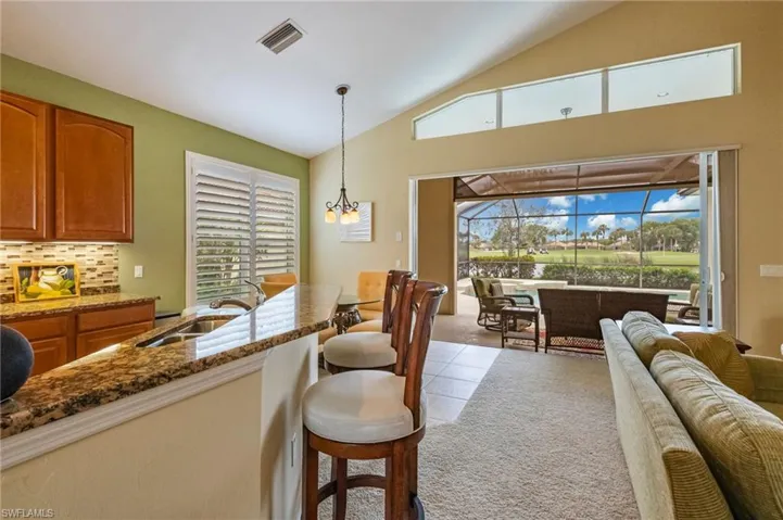 Great Room with Open Sliding Doors to Pool and Spa