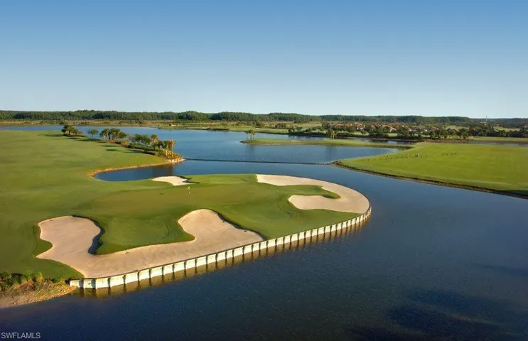 View of community featuring view of golf course and a water view