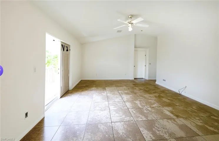 Photo edited to show what the room would look like with white paint on the walls.