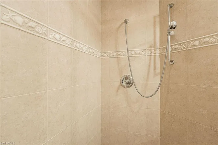 Interior details with a tile shower