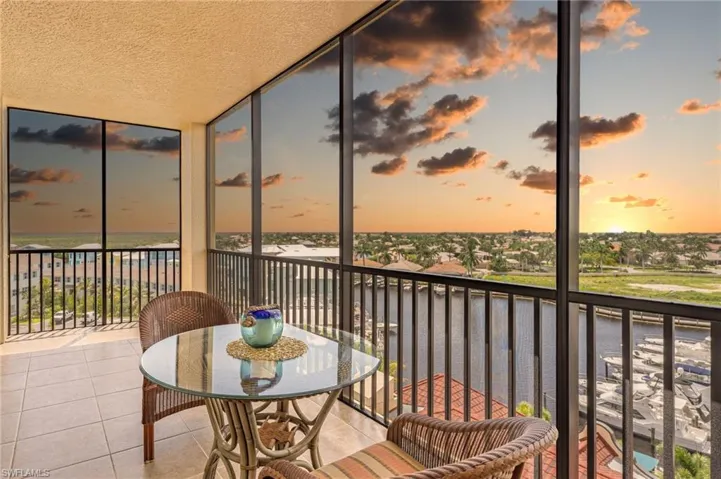 Balcony at dusk with a water view