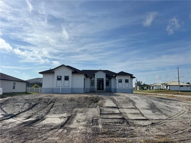 View of front of property featuring stucco siding