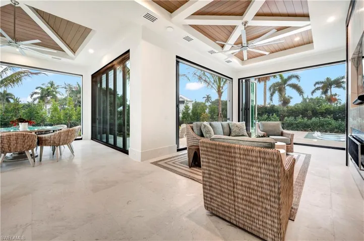 Indoor/Outdoor living. Air-conditioned with electric screens.