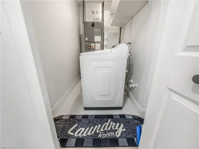 Washroom with washer / clothes dryer