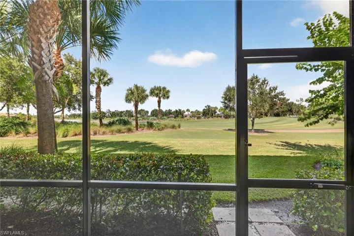 View of grassy yard featuring golf course view